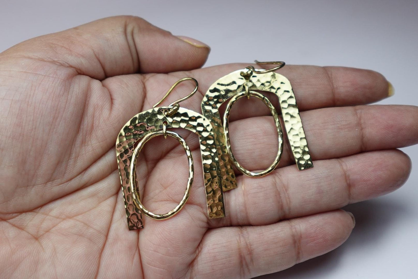 Hammered Horseshoe Brass Earrings - Statement earrings with a bold arch and hammered finish in gold-tone brass.
