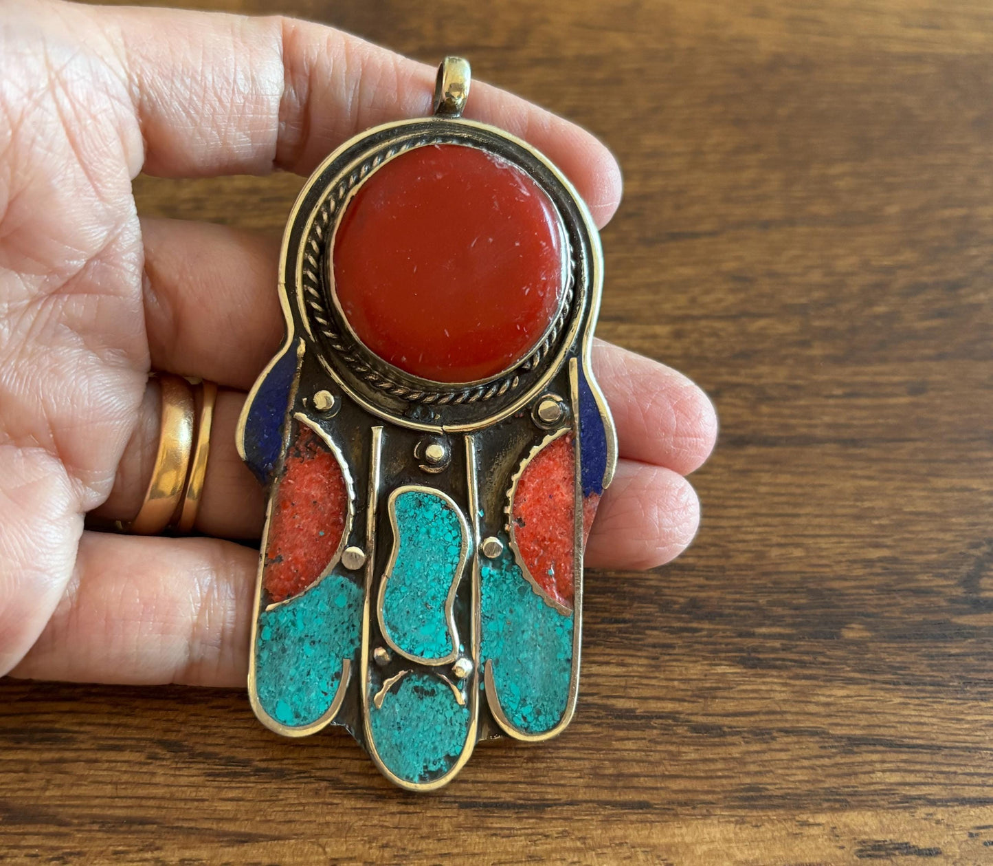 Silver Plated Tibetan Hamsa pendants.